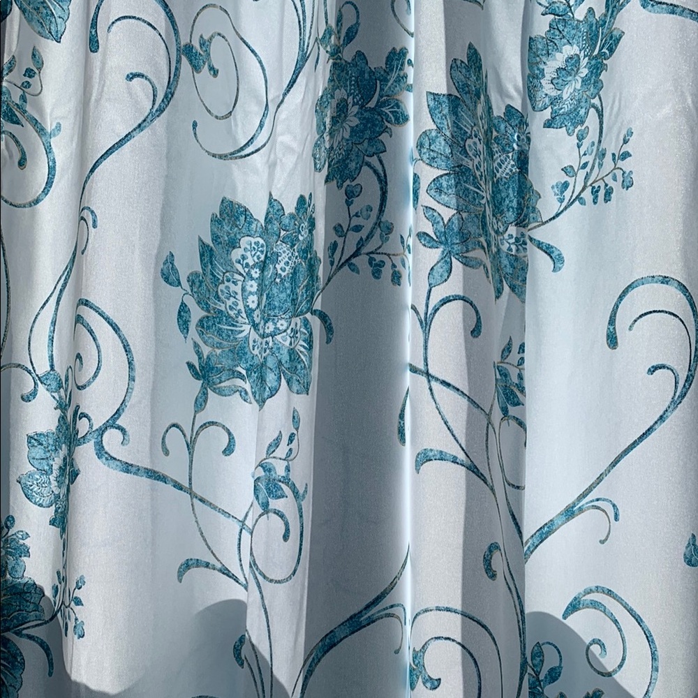Blue and White Floral Accent Curtains with Elegant Scrollwork